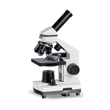 Monocular student microscope with 360 degree rotating head, three objectives and mechanical stage with vernier scales