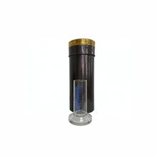 Assembled metal rain gauge with brass-rimmed funnel on top and glass measuring cylinder in front
