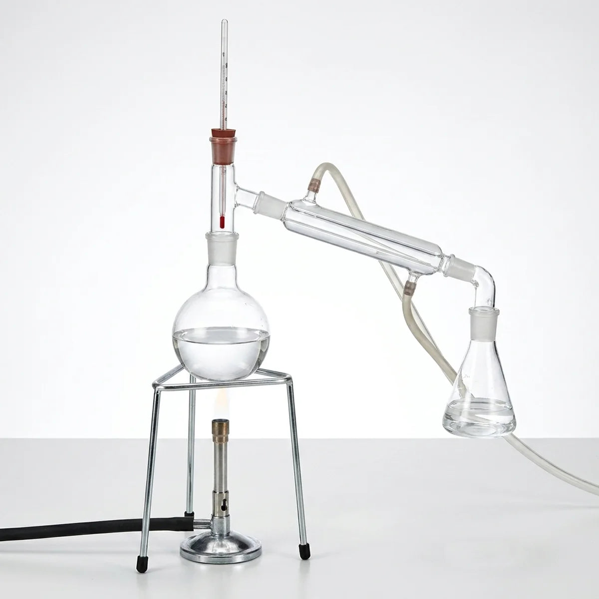 Tripod stand supporting distillation setup