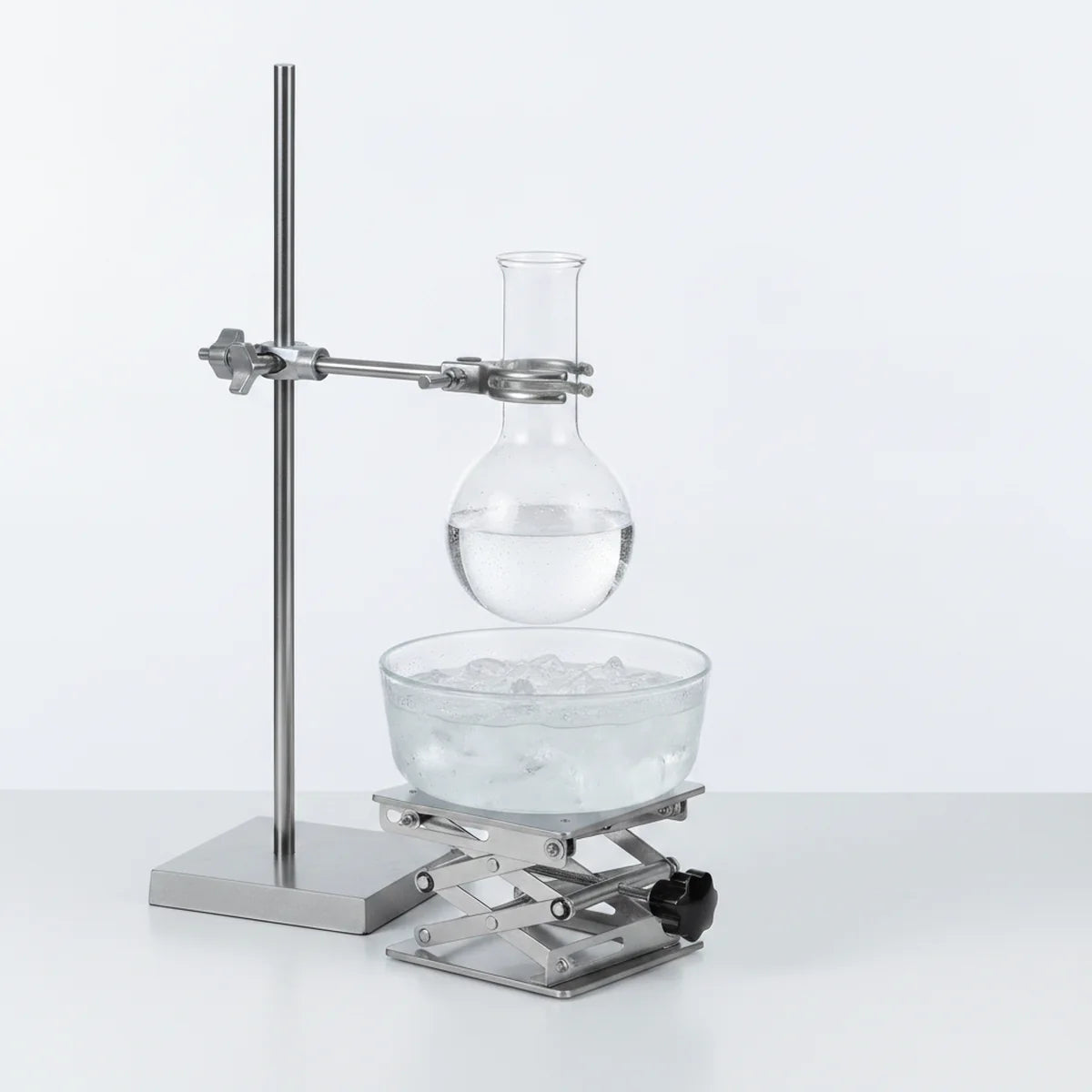 Lab jack raising ice bath to flask