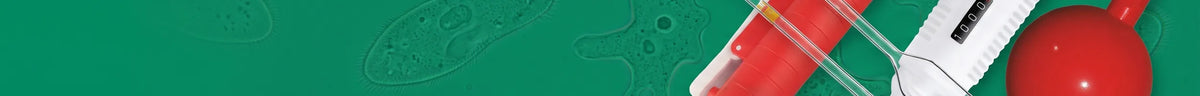 Pipette filler pump, adjustable micropipette, red pipette filler bulb and glass pipettes on an emerald background