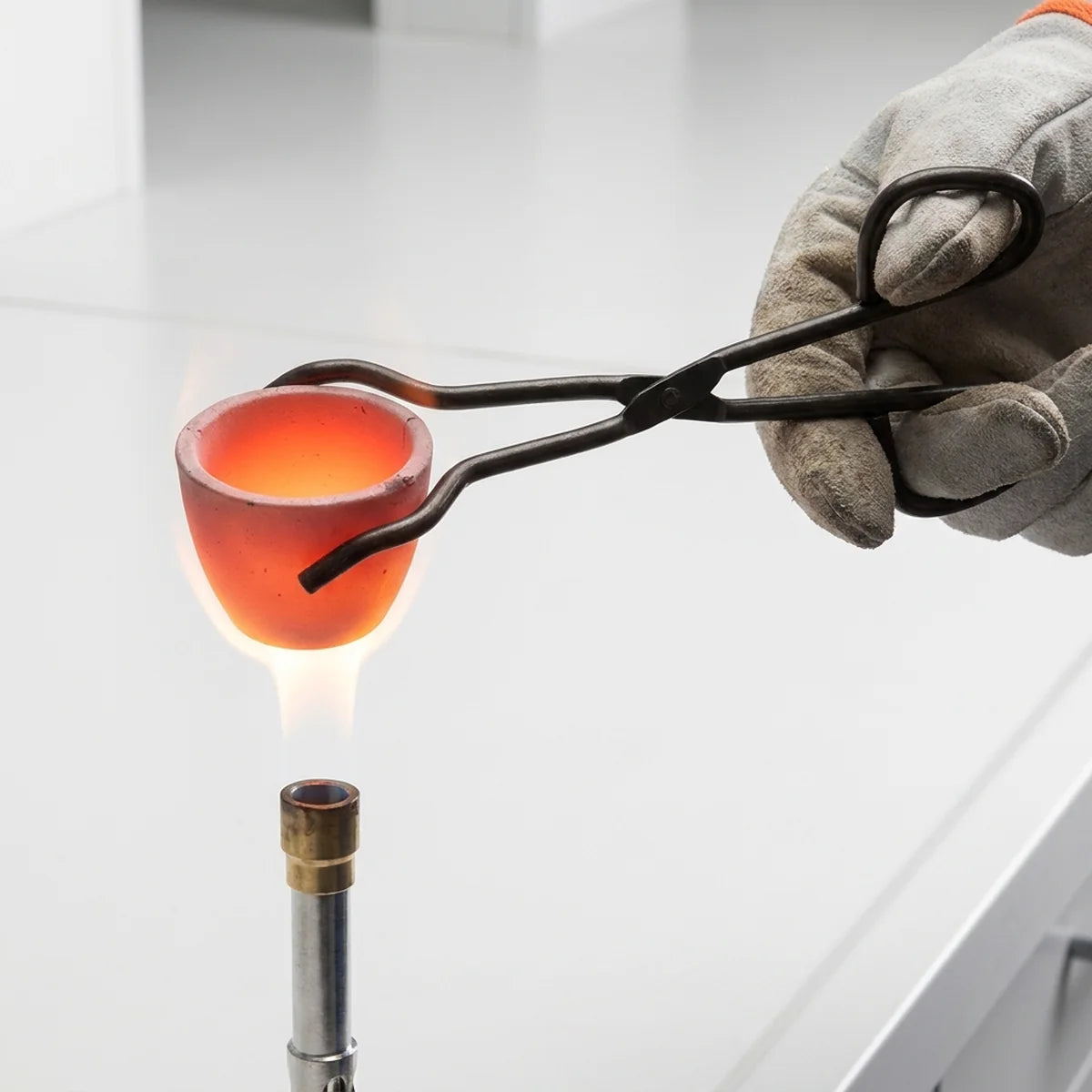 Crucible tongs lifting hot crucible