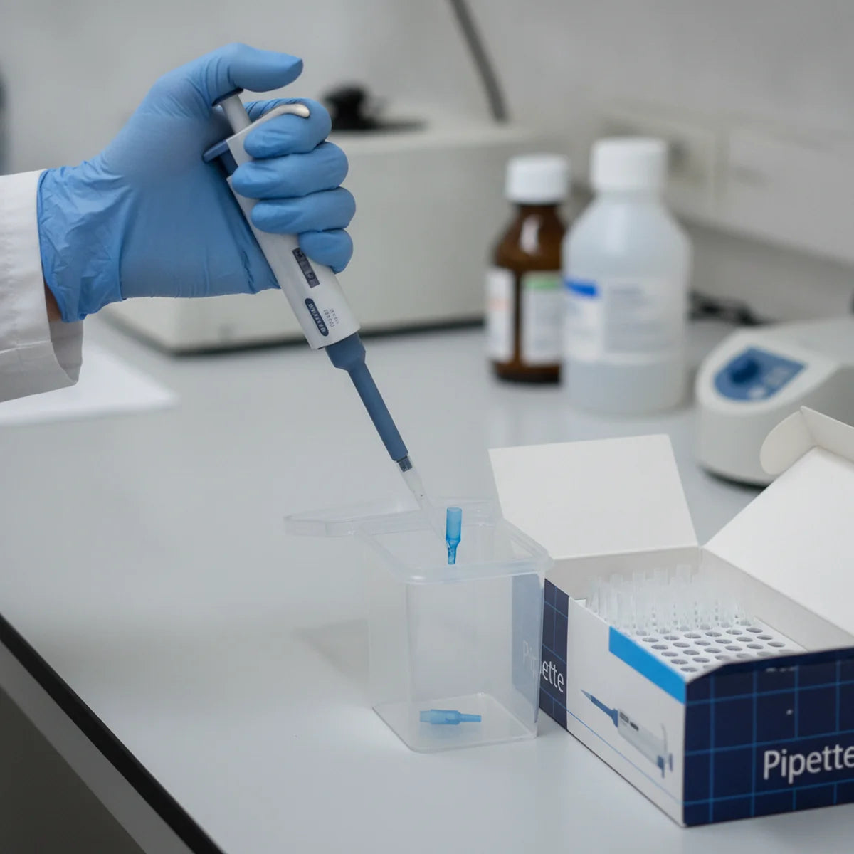 Ejecting a used pipette tip from a mechanical pipette