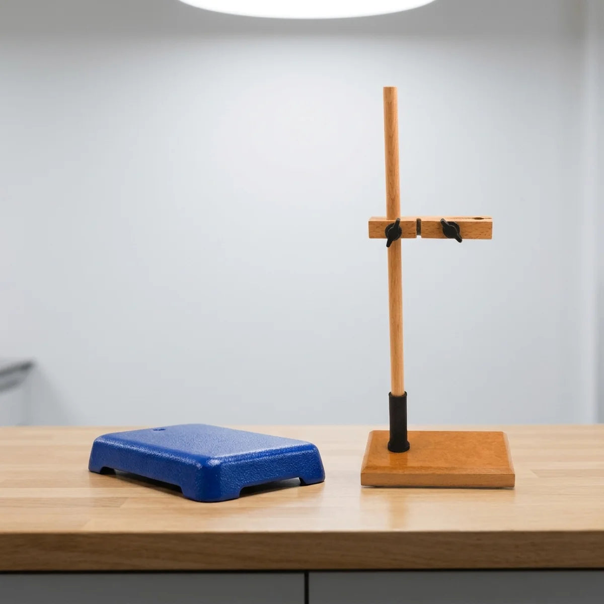 Cast iron versus wooden stand base