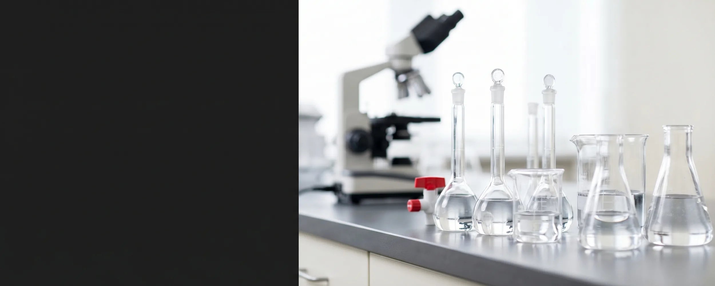 SmartLabs laboratory glassware and microscope on a clean lab bench