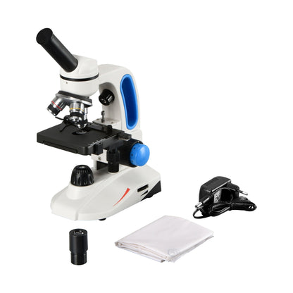 Monocular student microscope shown with power adapter, spare eyepiece and white dust cover
