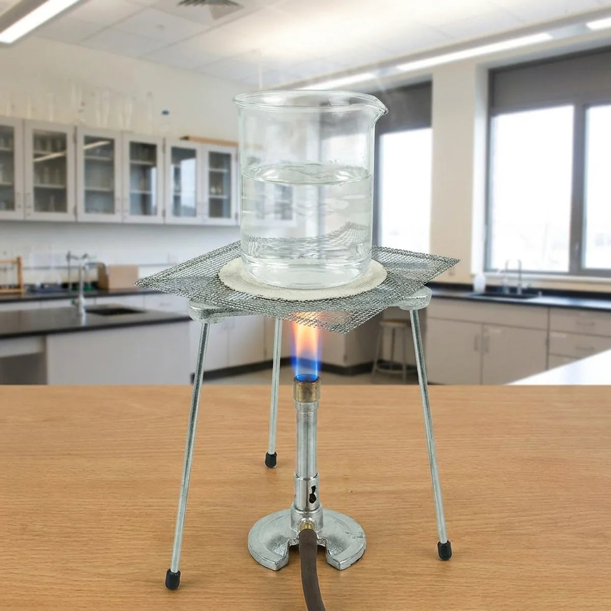 Tripod supporting a beaker over a flame